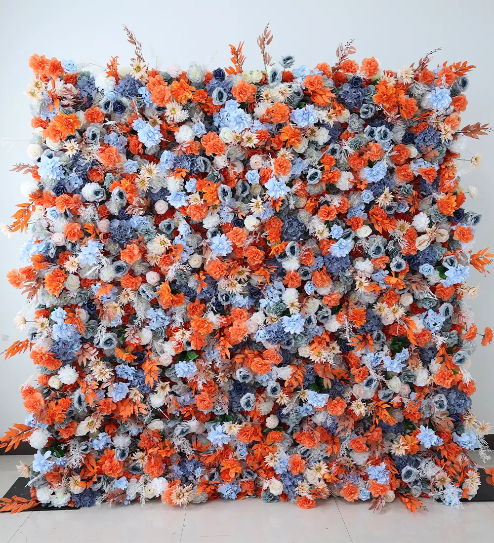 Cee Indigo — Immerse yourself in the lush beauty of our exotic blue and orange flower wall, a breathtaking display that captures the essence of a natural oasis at your event