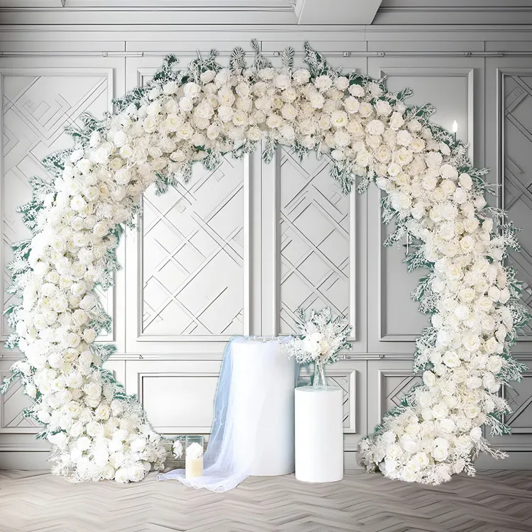 Cloud 9 — A half circle arch in white, cut clean against the skyline and lit to hold its shape after dark