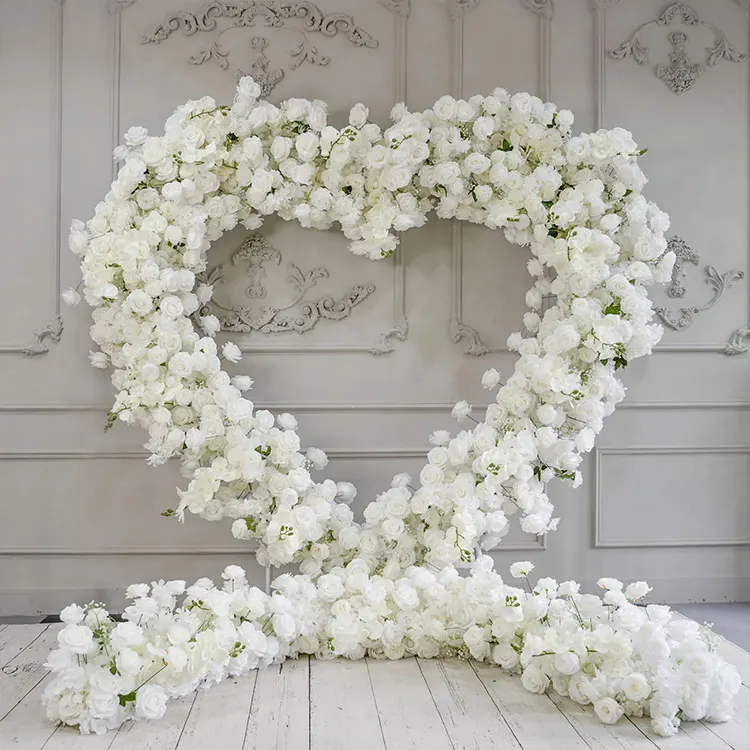 Cloud 9 — Cream blooms drawn into a full heart, warm rather than white, and gentle on camera