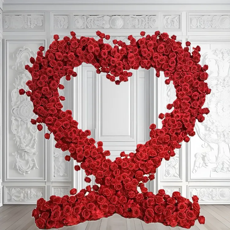 Cupid — A full red heart arch in deep roses — the classic, executed properly