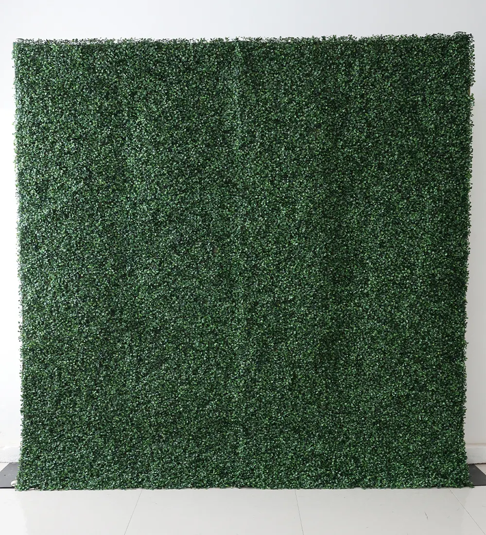 Greenstreak — This boxwood wall, effortlessly blending nature and minimalism, offers a perfect photo backdrop for corporate events, enhancing brand messaging with simplicity