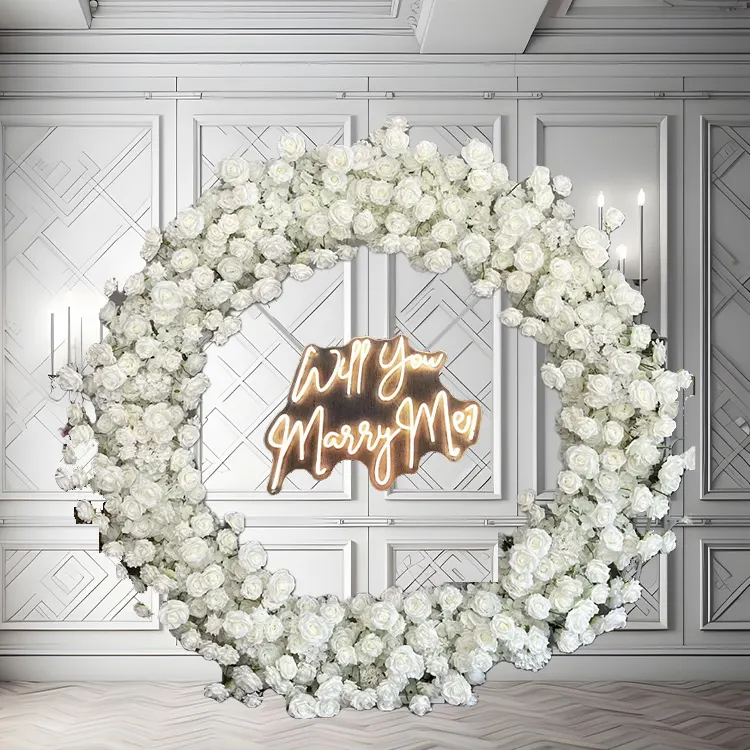 Snowflake — A white circle arch finished with a Marry Me sign, ready for the photograph you will actually frame