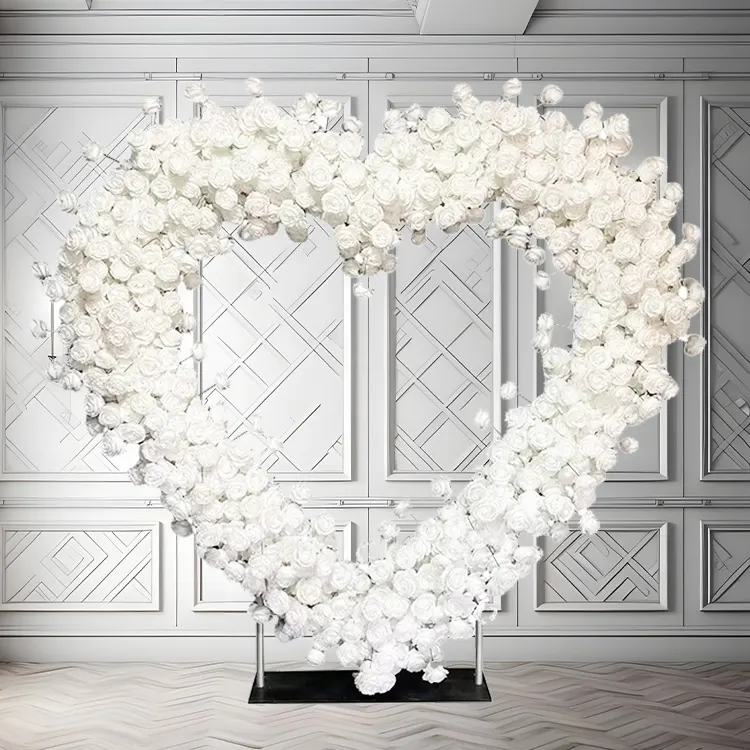 Infinity — A white heart archway, weightless-looking and quietly romantic