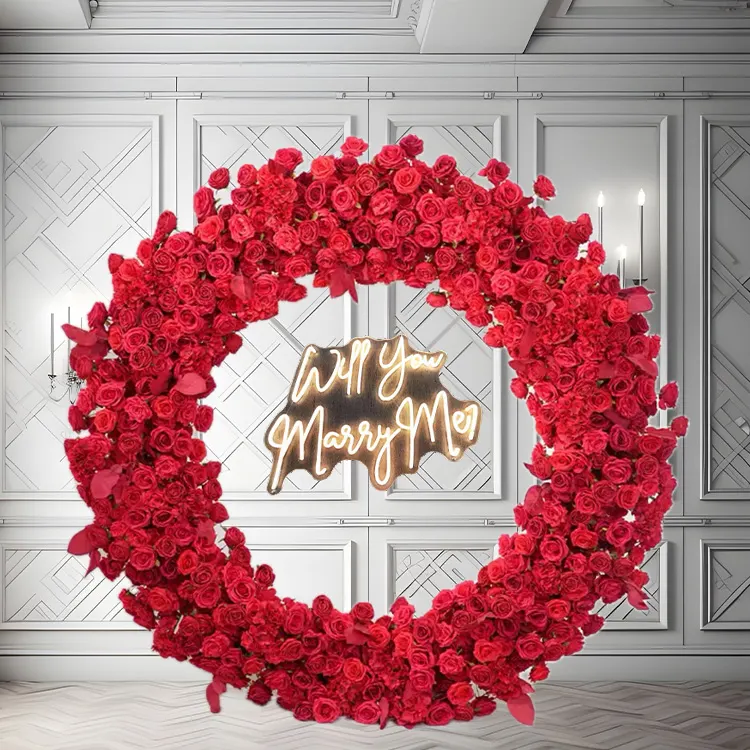 Infinity — A red circle arch with a Marry Me sign set inside it, so the photograph tells the whole story on its own