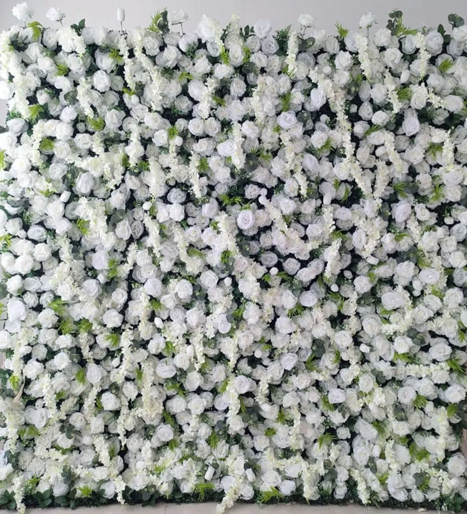 Joy — The clean white with a hint of yellow cascading stand out against the stunning background of greenery