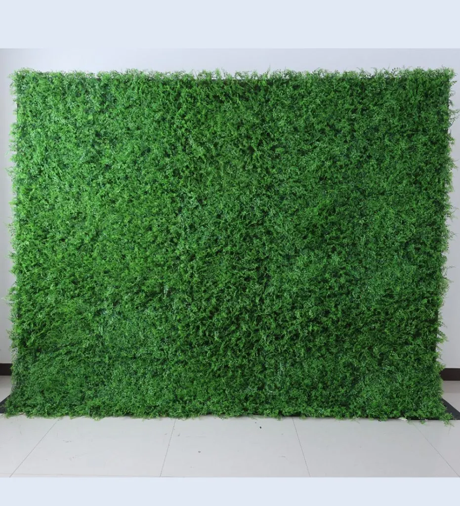 Paris — This lush green flower wall is a stunning showcase of vibrant foliage, offering a serene and natural backdrop for any occasion