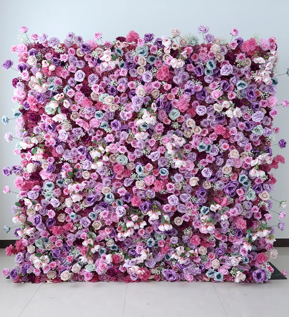 Purple Baby — This captivating flower wall features a stunning array of purple roses in various shades, beautifully accented with elegant purple feathers