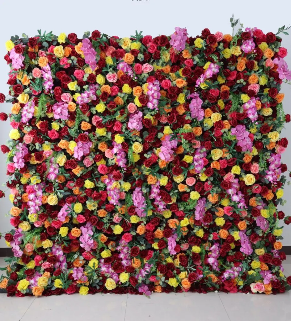 Rio De Janerio — Make a striking statement with our bold and vibrant flower wall rental, featuring a stunning mix of bright yellow, orange, pink, red, and cascading purple blooms